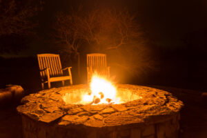 Outdoor fire pit in backyard setting